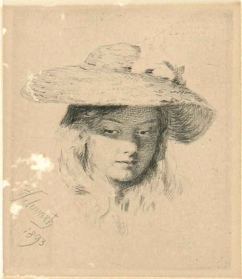 En ung pige med stråhat