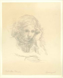 Pige med hånd ved kind