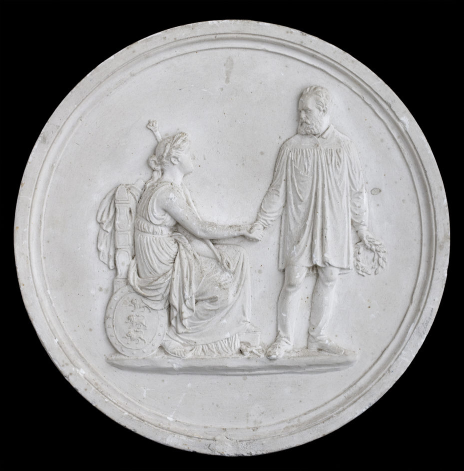 Bissen stående med kvindelig genius i hånden