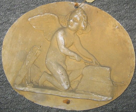 Amor slibende en pil