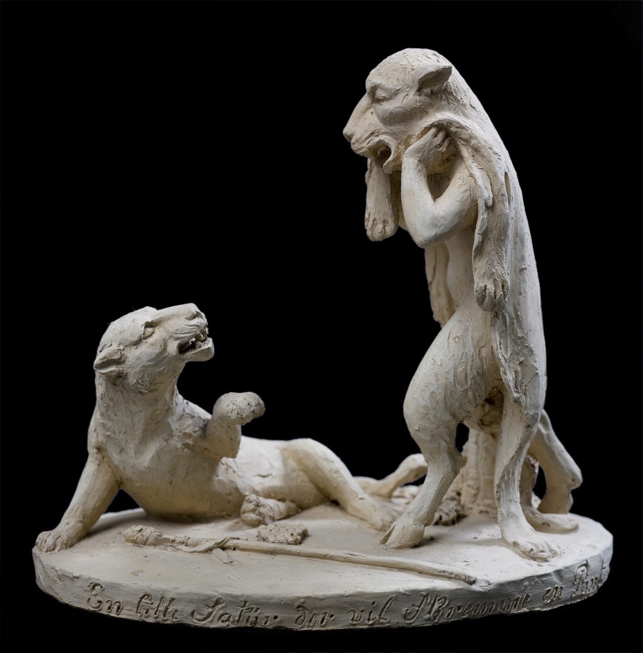 Lille satyr, der vil skræmme panter med en løvehud